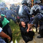 Nepalese riot police arrest Tibetan protesters 