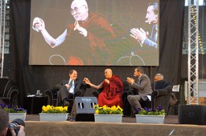 His Holiness the Dalai Lama during his talk “Happiness in a Troubled World” in Palatrento Stadium in Trento, Italy, on April 11, 2013. PhotoJeremy Russell OHHDL