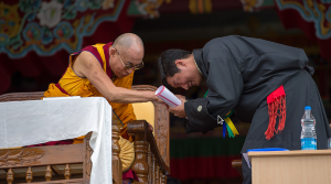 Sikyong Dr Lobsang Sangay with His Holiness at the 23rd anniversary of the conferment of the Nobel Peace Prize to His Holiness Photo: OHHDL