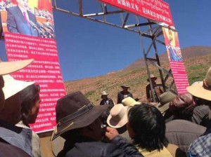 Mining protesters in Dzatoe county display banners of statement by President Xi Jinping urging protection of the environment, August 2013. Photo: RFA