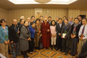 His Holiness the Dalai Lama with a group of Chinese writers after their meeting in New York on October 21.  Photo/Jeremy Russell/OHHDL