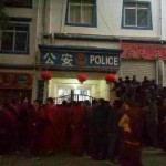 Monks gathering at the police station Photo: Phayul