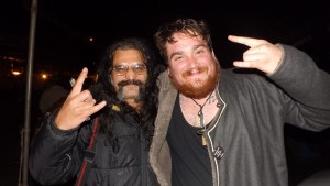 Subir Malik, musician and manager of Parikrama (left) and Contact contributing writer Christ Healey poses for a picture after the show.