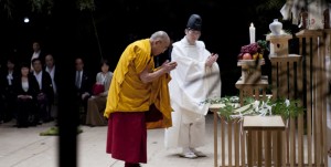 His Holiness the Dalai Lama offering prayers with a Shinto priest for victims of the devastating natural disaster in Sendai Photo/Office of Tibet