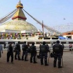 Nepalese police in riot gear keep watch at the Boudhanath Stupa in March 2013 Photo: tibet.net