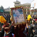 Young monks carry His Holiness the Dalai Lama's picture through the streets of Kathmandu Photo: Tibet.net