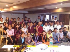 Additional Election Commissioner Ven Geshe Tenpa Tashi with Tibetan college students in Baroda. Photo:tibet.net 